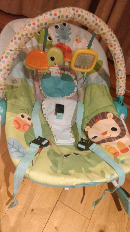 bright starts playful parade rocker